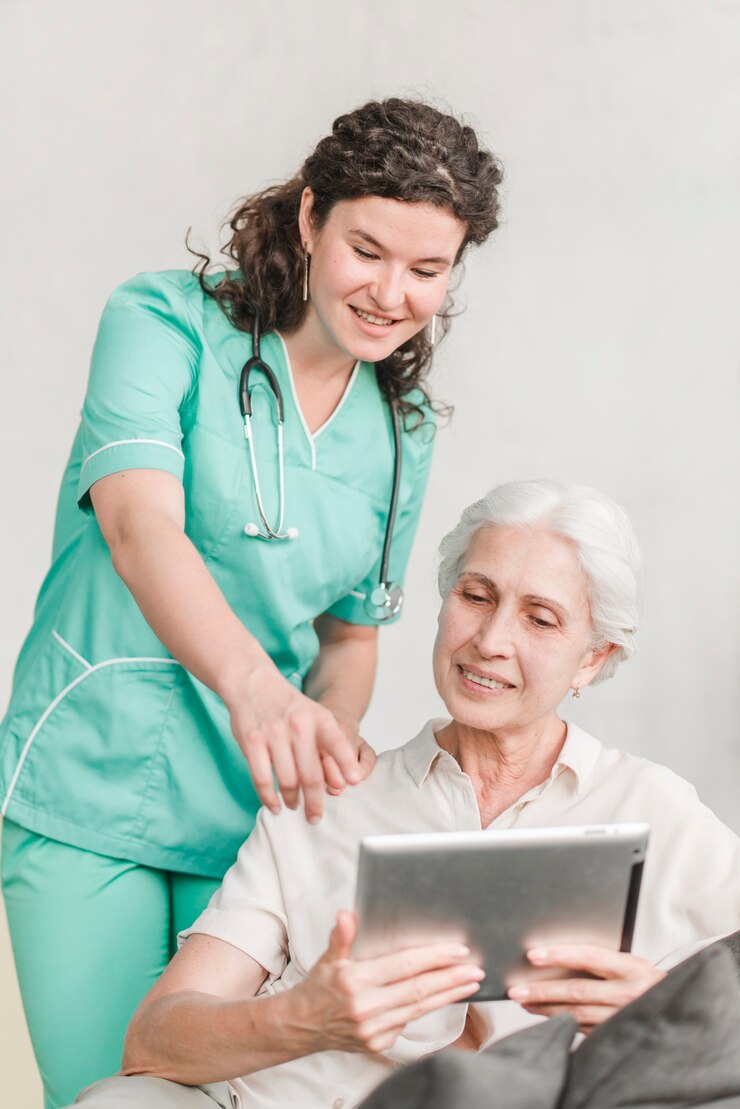nurse-pointing-screen-showing-something-her-patient-digital-tablet_23-2147861469 nurse-pointing-screen-showing-something-her-patient-digital-tablet_23-2147861469